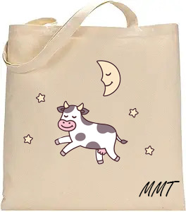 Beige tote with cow, moon, and stars logo